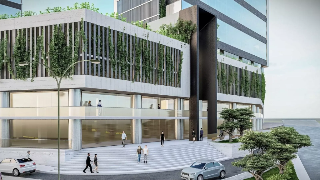 Proyecto edificio distrito artemisa ubicada en el blvd.suyapa, con fachada color blanco y beige.